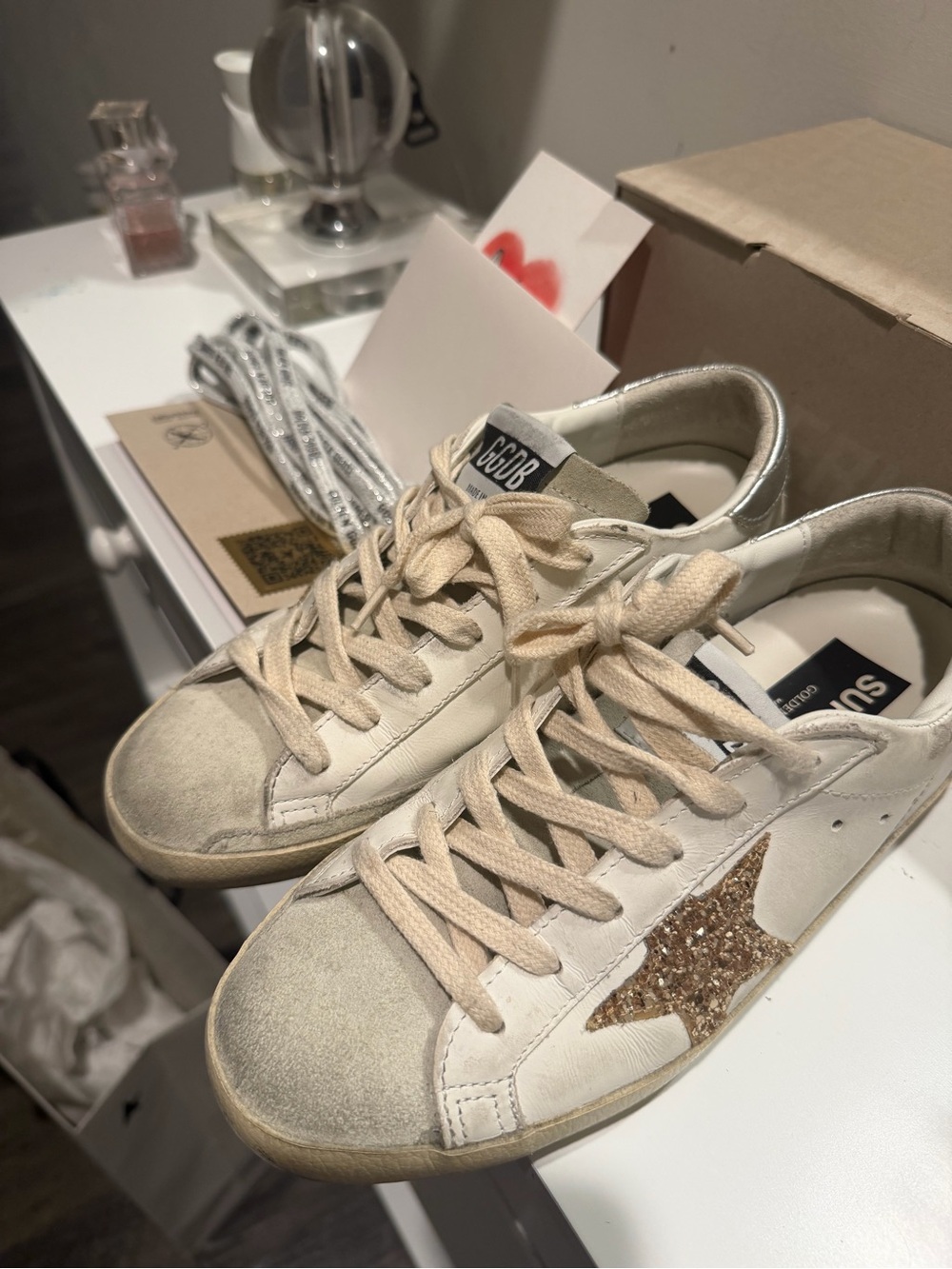 Golden Goose Women's Super-Star with gold glitter star and ice-gray su